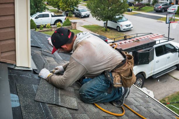 Professional Roofing technician working in Harwinton, CT